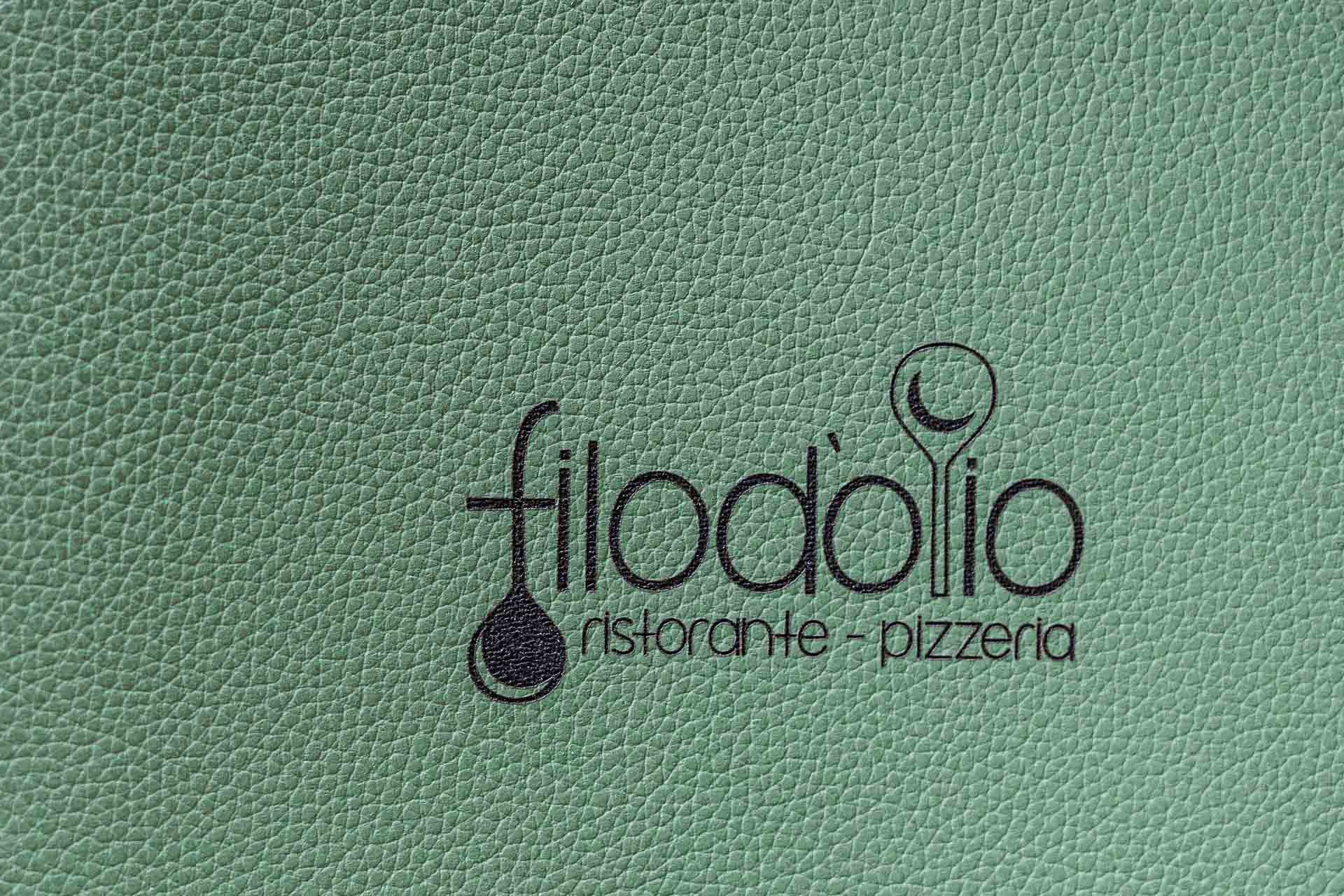 Il menu del Ristorante Filo d’Olio con il logo impresso